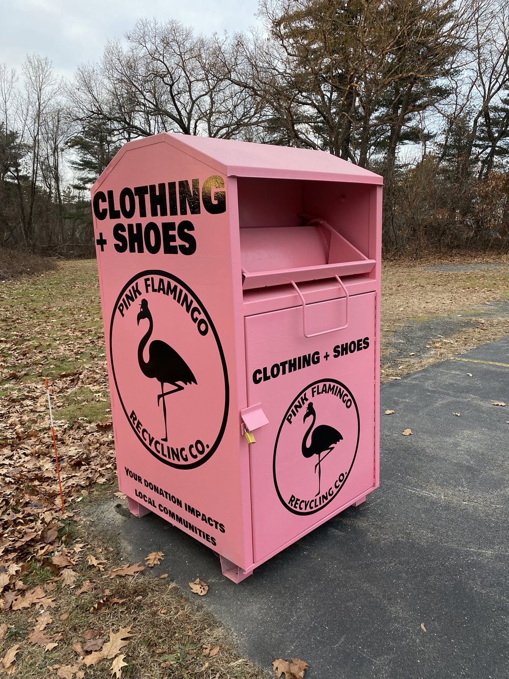 A Pink Flamingo Recycling Co. clothing donation bin